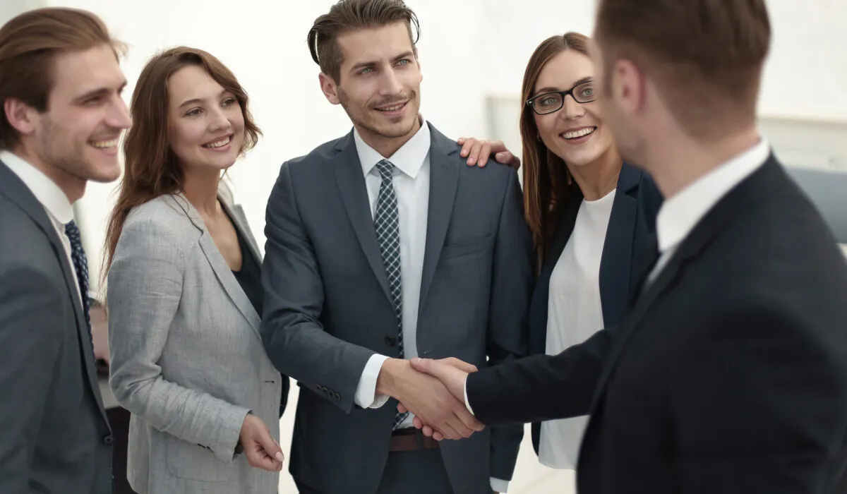 handshake in the lobby of an office building Business partner in a modern office building